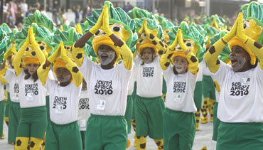 Revellers wearing South Africa World Cup 2010 shirts parade during a carnival in Sao Paulo on Saturday