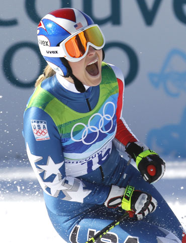 Lindsey Vonn celebrates after winning the gold in the women's Alpine Skiing Downhill race