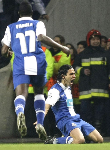 Porto's Radamel Falcao (right) is ecstatic after scoring the winner against Arsenal