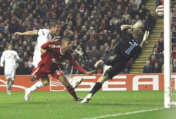 David Ngog heads the ball into the net