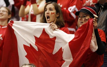 Canadian fans cheer for their team
