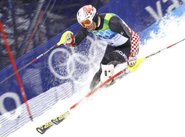 Croatia's Ivica Kostelic clears a gate during the second run of the men's alpine skiing slalom event
