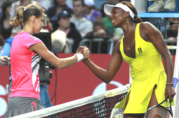 Venus Williams (right) greets Lucie Safarova after their match