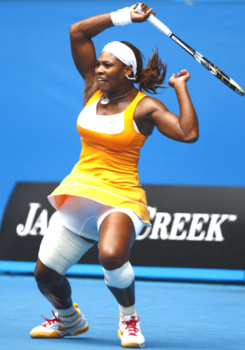 Serena Williams of the US returns a shot against Czech Republic's Petra Kvitova