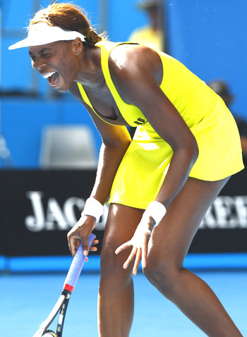 Venus Williams reacts during her match against Austria's Sybille Bammer