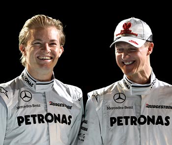 Nico Rosberg (left) with Michael Schumacher