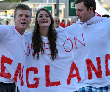 This English fan doesn't mind sharing her space or shirt with the guys