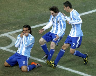 Carlos Tevez celebrates a goal