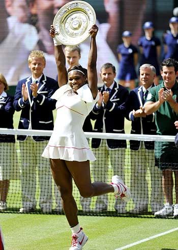 Serena Williams celebrates on winning her Wimbledon title in 2012