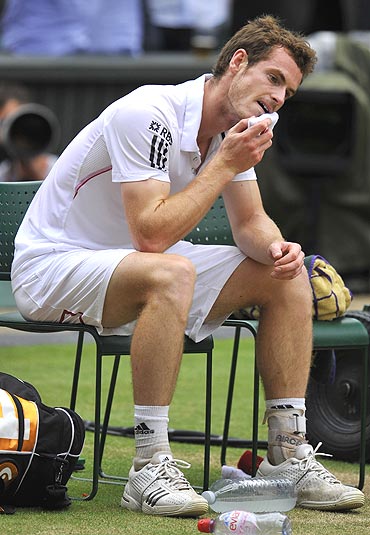 Britain's Andy Murray reacts after losing the match