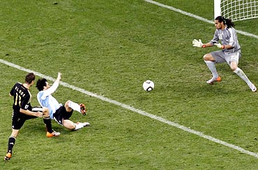 Miroslav Klose (left) scores the second goal for Germany