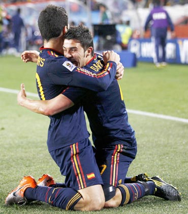 David Villa celebrates after scoring against Paraguay