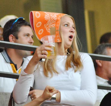 A Netherlands fan reach during a match