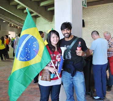People from different nationalities support Brazil