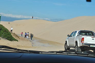 The sand dunes along the coast of Nelson Mandela Bay...on a day like this, they blow across the road, rendering it unusable