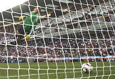 Manuel Neuer watches as Frank Lampard's strike crosses the goalline during the match against England