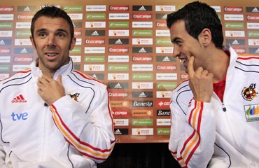Carlos Marchena (left) and Sergio Busquets attend a news conference in Potchefstroom