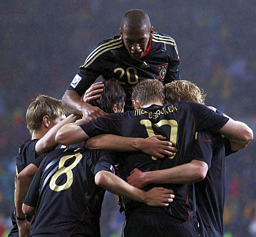 Germany team celebrate after winning the match