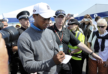 Tiger Woods signs autographs in St Andrews, Scotland
