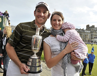 Louis Oosthuizen with his wife Nel-Mare and daughter Jana after winning the British Open