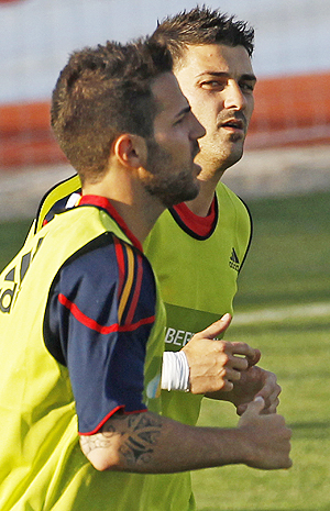 Cesc Fabregas (left) and David Villa