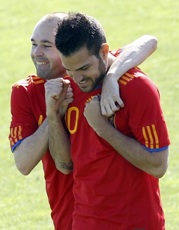 Cesc Fabregas alongwith Andres Iniesta