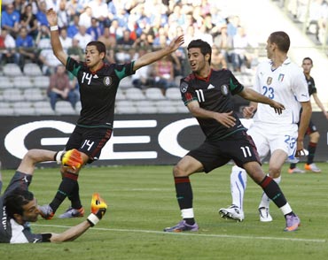 Mexico's Carlos Vela celebrates after scoing against Italy during their warm-up matches