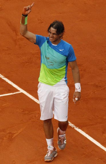 Rafa Nadal reacts after beating Robin Soderlng