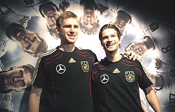 German players Per Mertesacker (left) and Arne Friedrich 