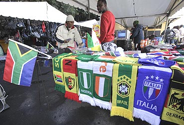Street vendors sell football world cup memorabilia in Cape Town