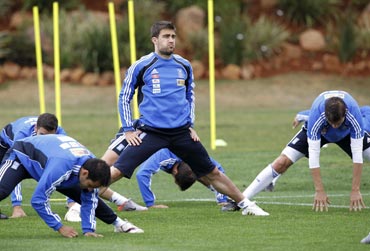 Greece's Michalis Sifakis stretches during a team training session in Durban