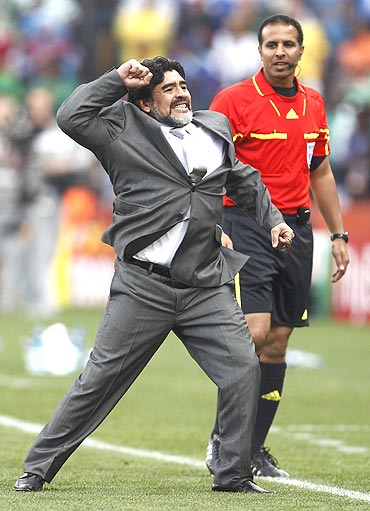 Argentina's coach Diego Maradona celebrates after Heinze's goal