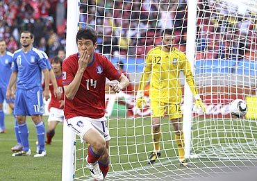 Lee Jung-soo celebrates afterscoring the first goal