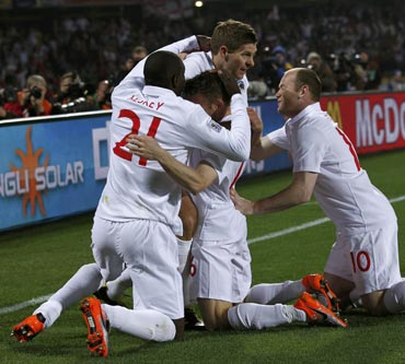 Steven Gerrard celebrates after scoring the first goal