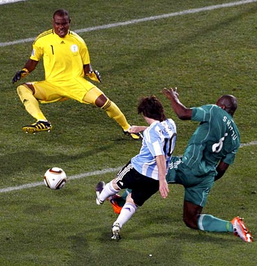 Messi's shot is saved by Nigeria goalkeeper Vincent Enyeama