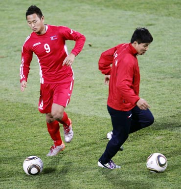 North Korean players during a warm up session