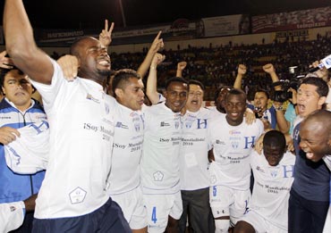 Honduras players celebrate after qualifying for the World Cup