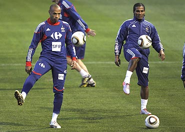 France's Thierry Henry (left) and Florent Malouda at a training session