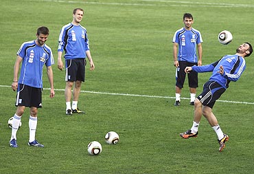Greek players go through the paces during a training session