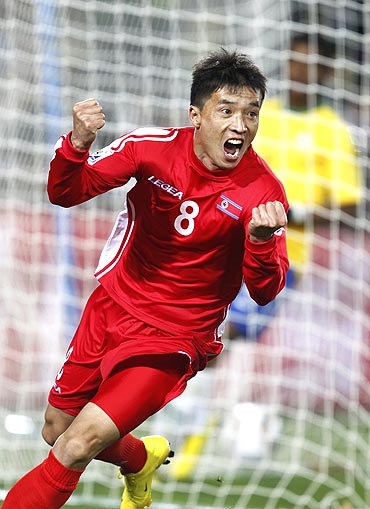 North Korea's Ji Yun-nam celebrates after scoring against Brazil
