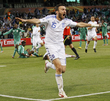Greece's Vassilis Torosidis celebrates his goal during the 2010 World Cup Group B soccer match against Nigeria