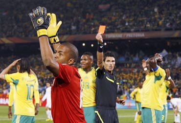 Referee shows a red card to South Africa keeper Itumeleng Khune