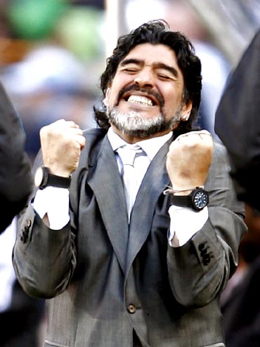 Argentina's coach Diego Maradona celebrates
