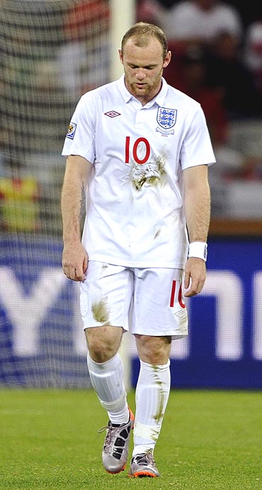 wayne rooney is a picture of dejection after england were held by algeria