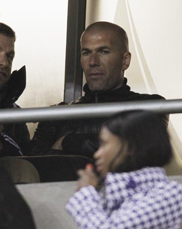 Zinedine Zidane watches the match