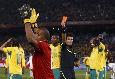 South African goalkeeper reacts after getting a red card