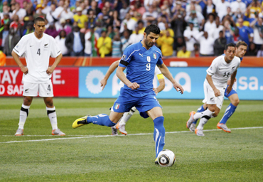 Italy's Vincenzo Iaquinta takes the penalty kick against New Zealand