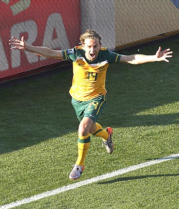 Australia's Brett Holman celebrates after scoring against Ghana