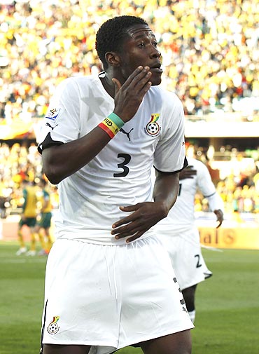 Ghana's Asamoah Gyan breaks into a jig as he celebrates his goal against Australia