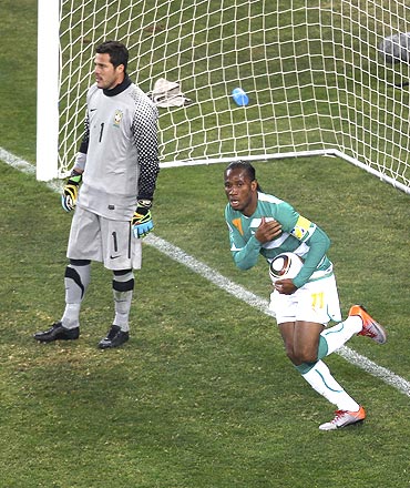Ivory Coast's Didier Drogba celebrates after scoring against Brazil